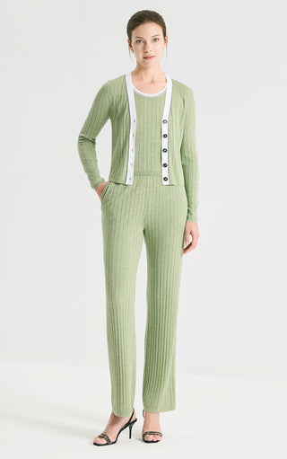 Olive green fine rib knit straight-leg trousers with elastic waist and subtle vertical ribbing.