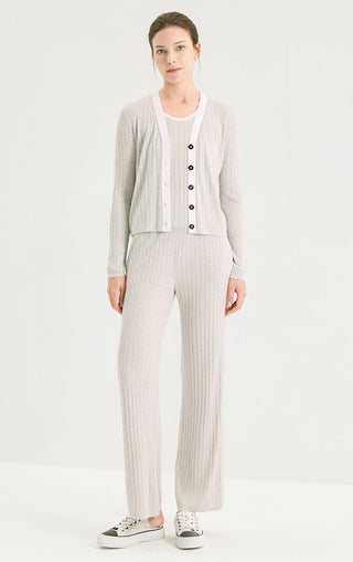 Light gray fine rib knit straight-leg trousers with elastic waistband and vertical rib stripes.