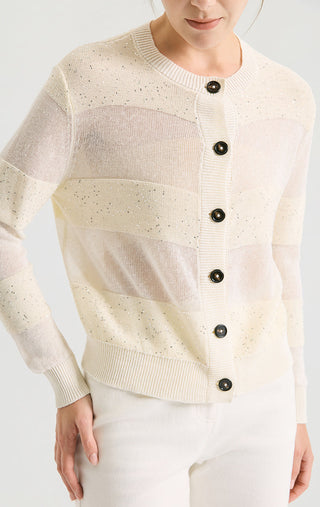Ivory sequin-striped cardigan close-up: button placket with speckled shine