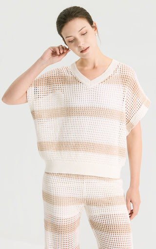 White open-knit V-neck top with tan sequined horizontal stripes and short sleeves