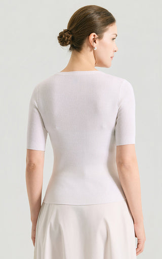 White ribbed knit top, back view; crew neck with beaded trim