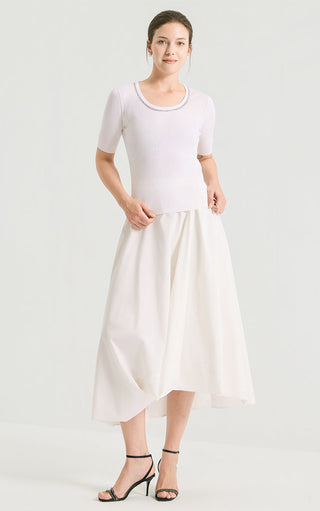 White ribbed knit top with crew neck beaded trim and short sleeves