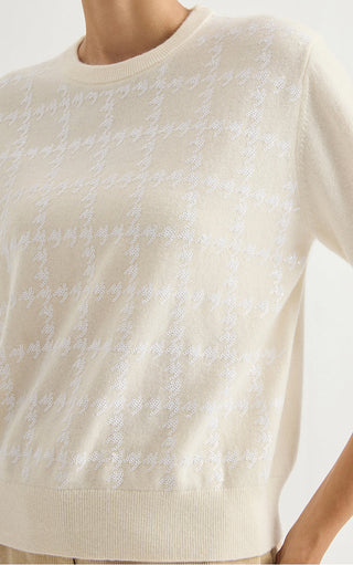 Ivory cashmere short-sleeve sweater with houndstooth knit pattern