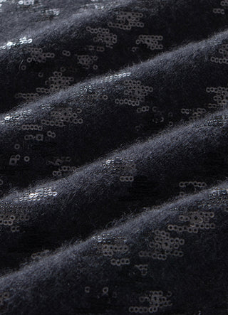 Dark grey sequin cashmere fabric close-up, textured shimmer