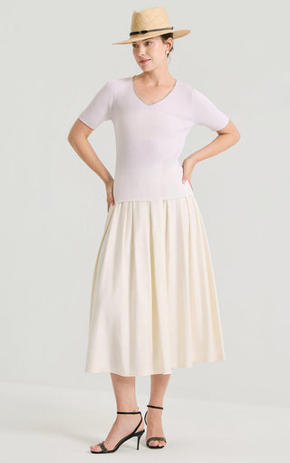 White ribbed knit V-neck top with short sleeves and fitted waist