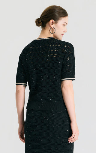 Black sequin open-knit short sleeve top back view with ribbed crew neckline and trim