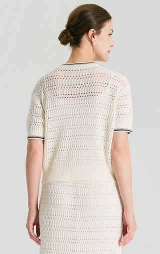 Ivory white sequin open-knit short sleeve top from back view, ribbed crew neck trim