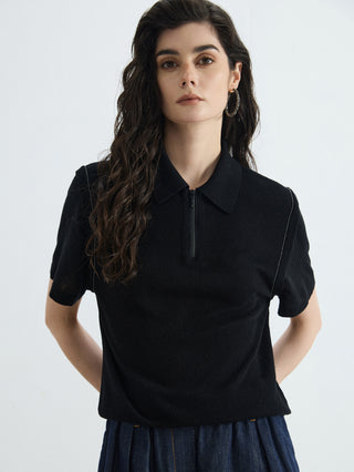 Black linen-silk blend half-zip polo knit top with ribbed collar and short sleeves