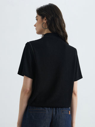 Black half-zip polo knit top from back, short sleeves and smooth ribbed knit