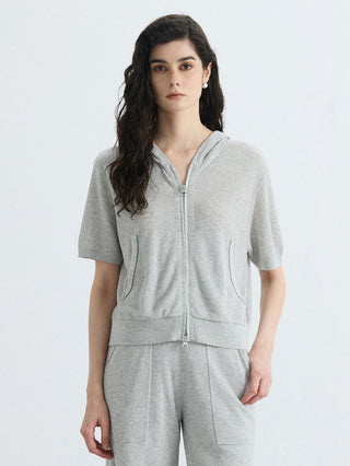 Gray linen-silk ribbed hooded zip-up top with short sleeves and front pockets.