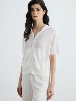 Ivory ribbed hooded zip-up top, short sleeves, front zip and patch pockets.