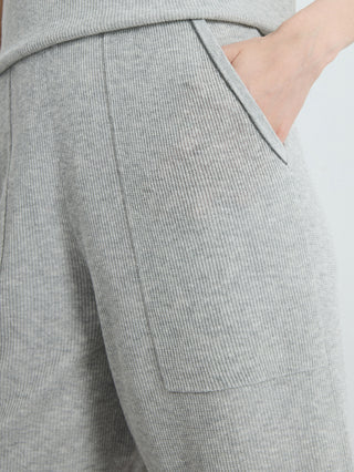 Gray ribbed knit shorts with cargo-style patch pocket and stitched seams