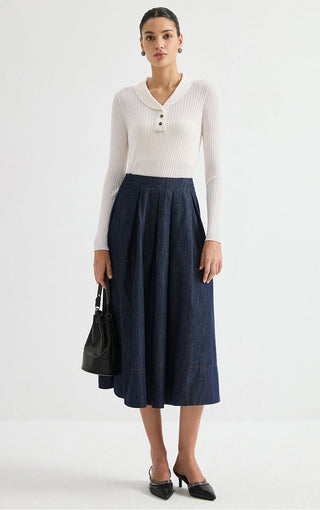White ribbed polo sweater with long sleeves and buttoned V-neck collar