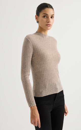 Light gray ribbed knit turtleneck sweater front view with straight hem