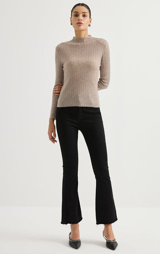 Light gray ribbed knit turtleneck sweater with long sleeves, relaxed fit at hips