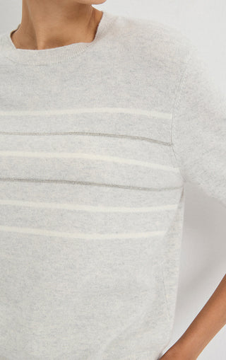 Light grey cashmere sweater with horizontal striped bands across chest