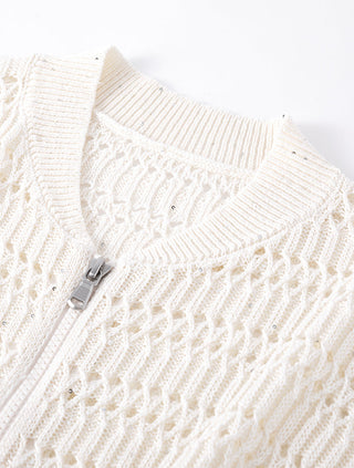 Ivory textured knit cardigan detail with sequin accents and ribbed neckline