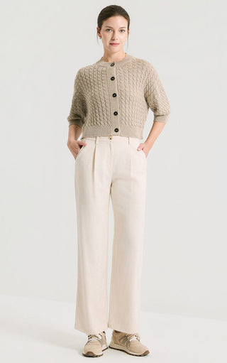 Dark camel cable-knit short cardigan with dark buttons and ribbed waist hem, full view