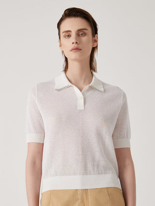 White knit polo-neck top with short sleeves, button front, and ribbed hem and cuffs.