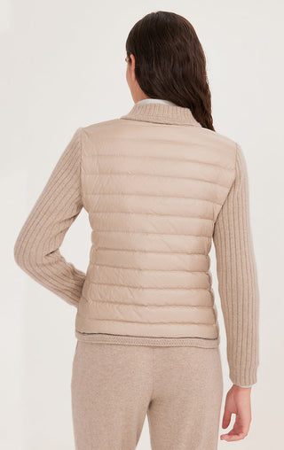 Back view of camel down knit jacket with horizontal quilting and ribbed knit sleeves