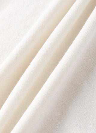 White wool-blend knit texture with fine ribbing, close-up