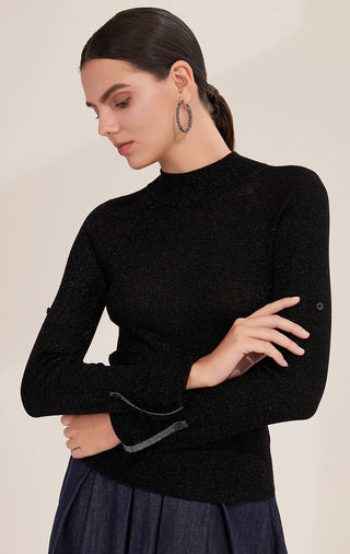 Black fitted knit top with mock neck, long sleeves and ribbed button cuffs