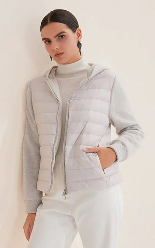 Light gray hooded zip-front puffer knit jacket with quilted body and knit sleeves