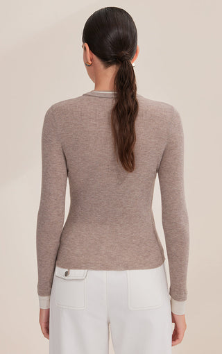 Back view of taupe rib-knit henley with long sleeves and button-free shoulder yoke