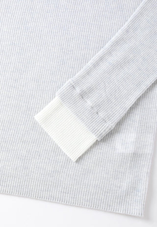 Light gray ribbed knit henley cuff and sleeve end detail