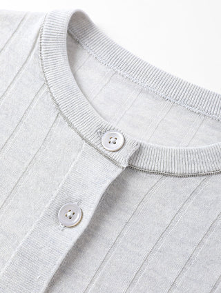 Close-up of gray-blue cardigan crew neck with button placket and ribbed collar