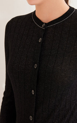 Black cardigan neckline with contrast piping and round button front