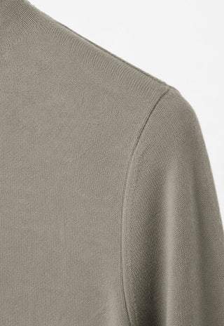 Cashmere turtleneck sweater shoulder seam detail, muted green-gray knit
