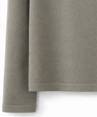 Cashmere turtleneck sweater sleeve in muted green-gray, smooth knit cuff