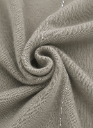 Cashmere turtleneck sweater with subtle beaded shimmer trim near neckline