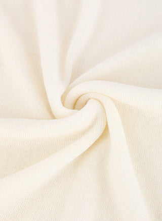 Wool blend knit fabric close-up in off-white; visible fine texture and weave
