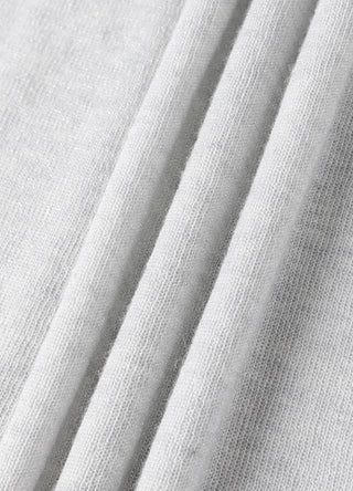 Gray-blue fine-gauge knit close-up showing vertical texture lines
