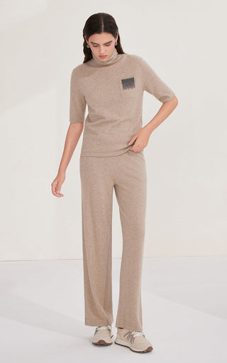 Camel short-sleeve turtleneck knit top with matching knit pants, front view
