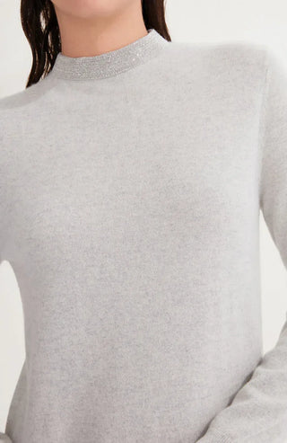 Close-up: light gray beaded high neck knit dress