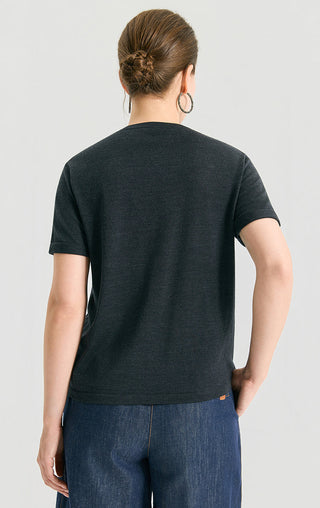 Back view of dark knit top with vertical lurex stripes, crew neck, short sleeves