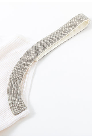 White camisole close-up showing sparkly beaded strap and arm opening
