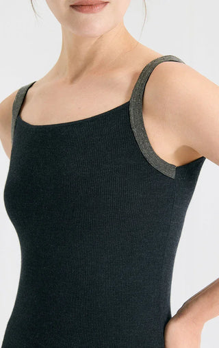 Black knit camisole close-up: square neckline and contrast strap edging