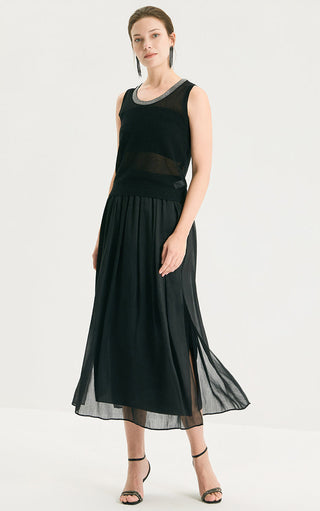 Black knit tank with silver-trimmed neckline and flowy midi skirt-like hem panel