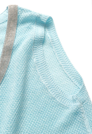 Light blue knit tank armhole with silver trim and ribbed edge