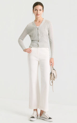 Light gray V-neck fitted short knit cardigan with button front and ribbed knit texture