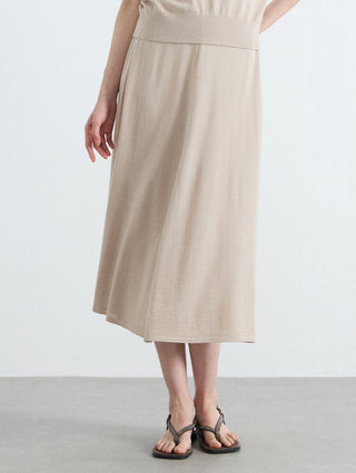 Oatmeal knit midi skirt with draped A-line fit and straight, mid-calf hem