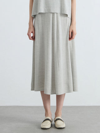Oatmeal high-waisted A-line knit midi skirt with smooth knit finish and mid-calf length