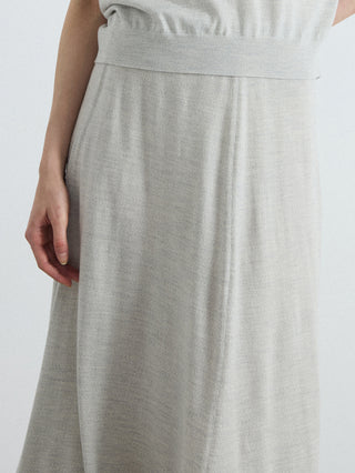 Oatmeal high-waisted A-line knit midi skirt with soft folds and roomy flare