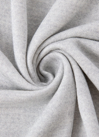 Light gray silk-wool knit fabric close-up with soft drape