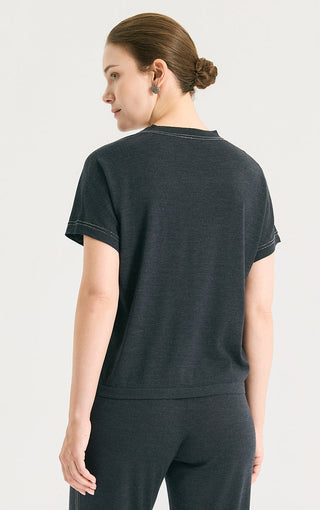 Dark gray knit T-shirt with curved back hem and double-stitched sleeve edges