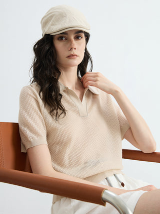 Oatmeal open-knit polo top close-up with pointed collar and short sleeves